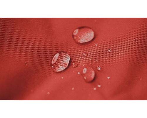 Gros plan de gouttes d''eau sur un tissu hydrofuge