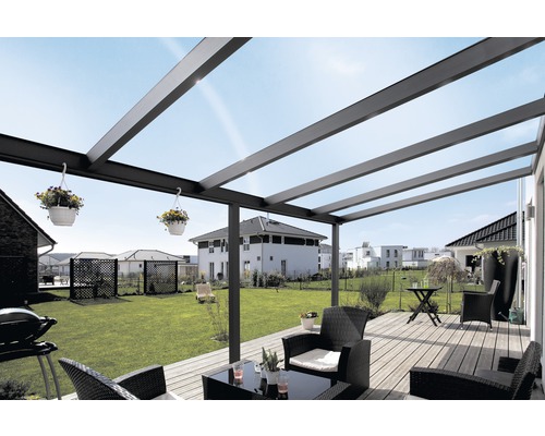 Terrasse avec toit, mobilier de jardin et vue sur le jardin