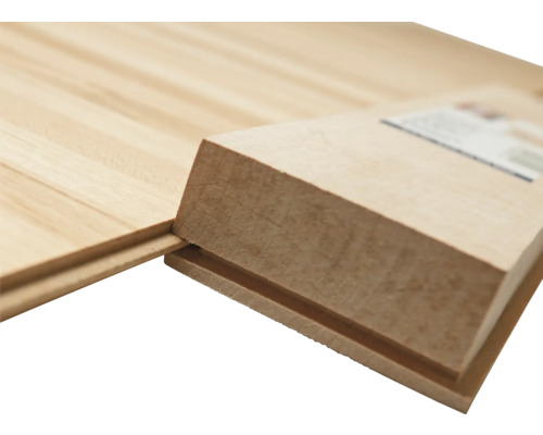 Assemblage de panneaux de plancher en bois avec système de rainure et languette