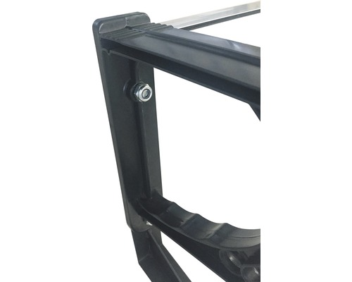 Gros plan d''un cadre en plastique noir avec une vis.