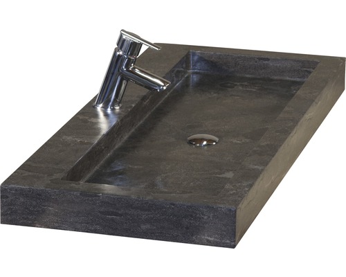 Rechteckiges Aufsatzwaschbecken aus Stein mit Armatur