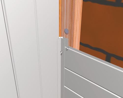 Detailansicht einer Zaunmontage mit Holzpfosten und Schrauben