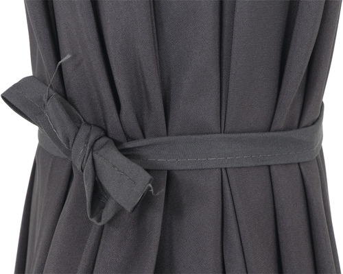 Gros plan d''un parasol attaché avec un ruban