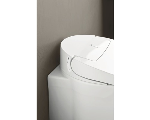 Vue détaillée de toilettes blanches avec panneau de commande