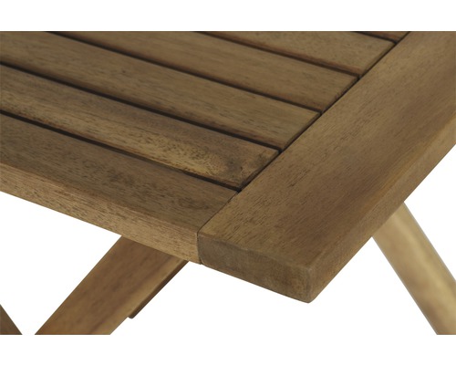 Vue détaillée d''une table de jardin en bois avec fonction pliante.