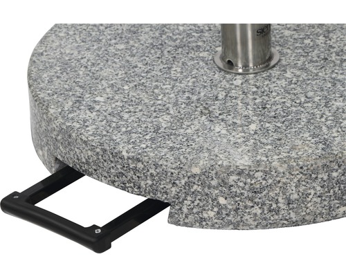 Gros plan d''un pied de parasol en granit avec poignée