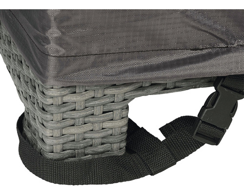 Vue détaillée d''une housse tissée avec une sangle de fixation pour un meuble de jardin en rotin