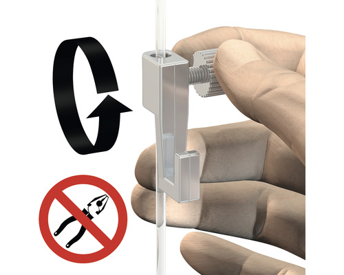 "Hand justiert Bildaufhänger an einer Bilderschiene