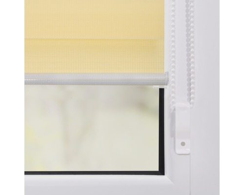 Gelbes Doppelrollo am Fenster