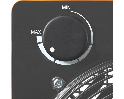 Nahaufnahme eines Drehknopfes mit der Aufschrift ''MIN'' und ''MAX'' zur Einstellung eines Heizgerätes.