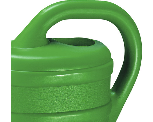 Detail vun enger grénger Bewässerungskanne mat Grëff