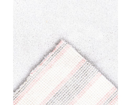 Vue détaillée d''un tapis clair avec envers textile