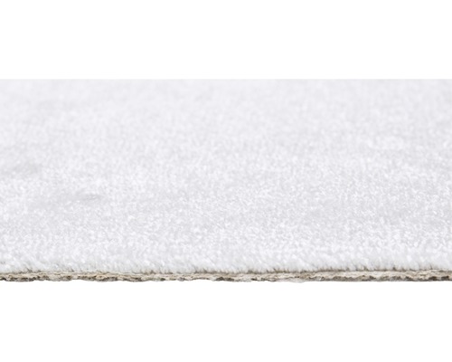 Gros plan d''un tapis blanc à poils