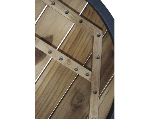 Vue détaillée d''un plateau de table rond en bois avec des vis