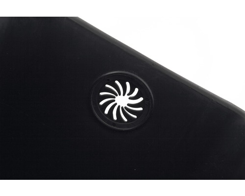 Gros plan d''un trou de ventilation dans un produit en plastique noir