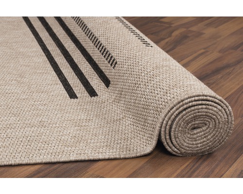 Tapis roulé avec motif à rayures