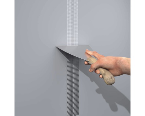 Spatule pour appliquer du ruban à joints sur un mur