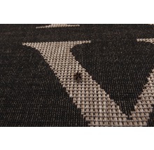 Vue détaillée d''un tapis avec un motif géométrique