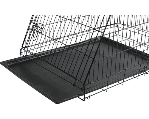 Detailansicht einer Hundebox mit Metallgitter und Kunststoffwanne