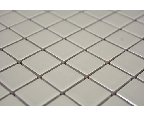 Gros plan d''une mosaïque de carreaux carrés