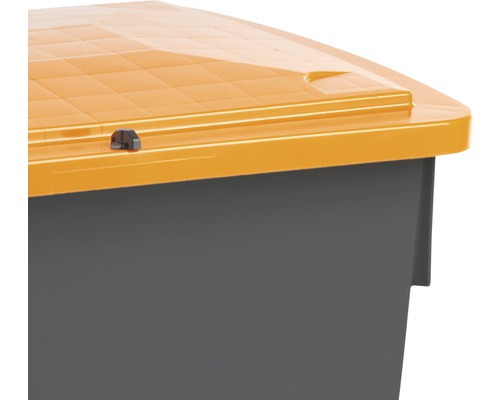 Vue détaillée d''un coffre de jardin en plastique avec couvercle