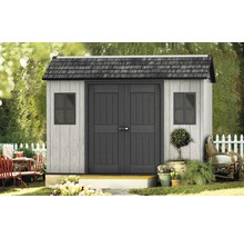 Abri de jardin avec porte double et deux fenêtres dans le jardin