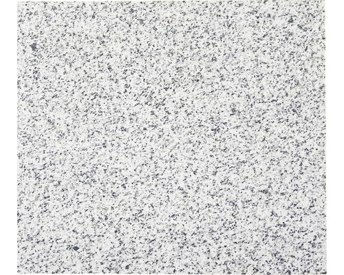 Gros plan d''une plaque de granit avec une texture mouchetée.