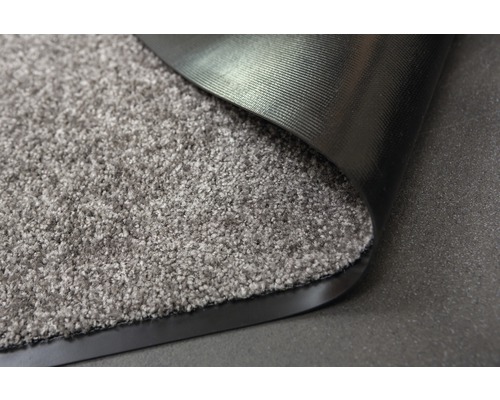 Paillasson avec surface textile et envers en caoutchouc