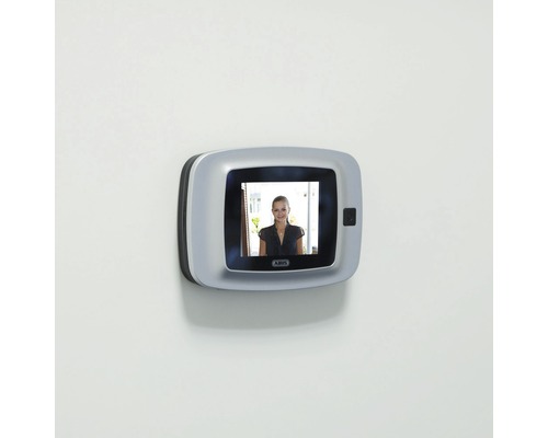 Digitale Türspionkamera mit Frau auf dem Bildschirm