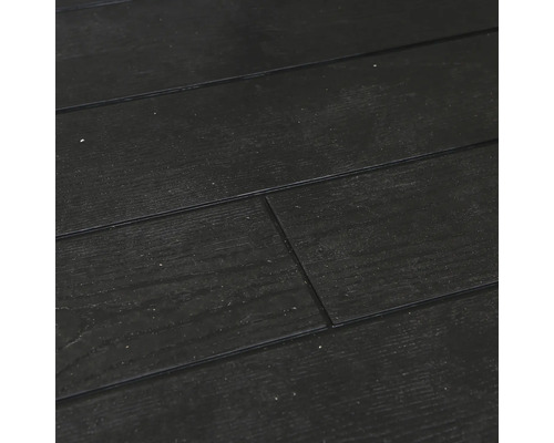 Gros plan d''un sol stratifié en bois noir