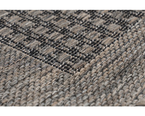 Gros plan d''un tapis à motifs avec texture