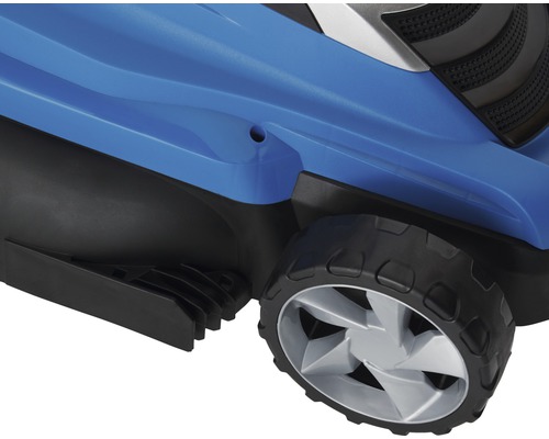 Détail d''une tondeuse à gazon avec roue et boîtier