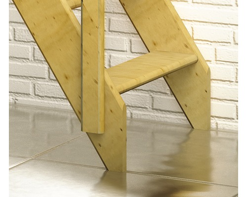 Vue détaillée d''un escalier en bois devant un mur en briques