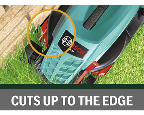 Vue détaillée d''une tondeuse à gazon coupant les bordures.