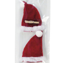 Deux mini-bonnets de Père Noël avec pinces à linge pour la décoration
