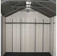 Vue intérieure d''un abri de jardin avec renforts muraux et structure de toit.