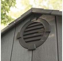 Detailansicht eines Gartenhauses mit runder Lüftungsöffnung
