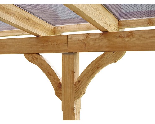 Gros plan d''un pavillon en bois avec poutres de soutien et toit