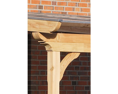 Vue détaillée d''une structure en bois avec un mur de briques en arrière-plan.