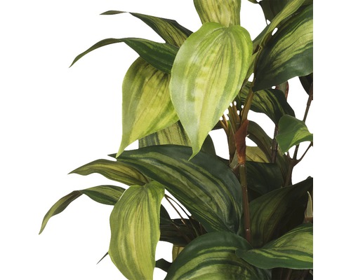 Künstliche Zimmerpflanze mit grünen Blättern