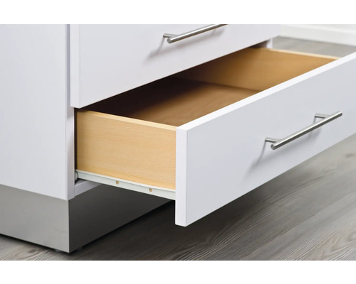 Meuble à tiroirs blanc avec tiroir en bois ouvert