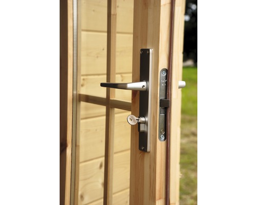 Vue détaillée d''une porte en bois avec serrure et clé