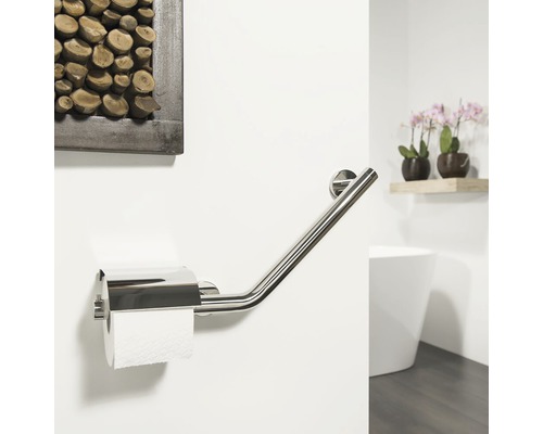 Porte-papier toilette en métal dans une salle de bain