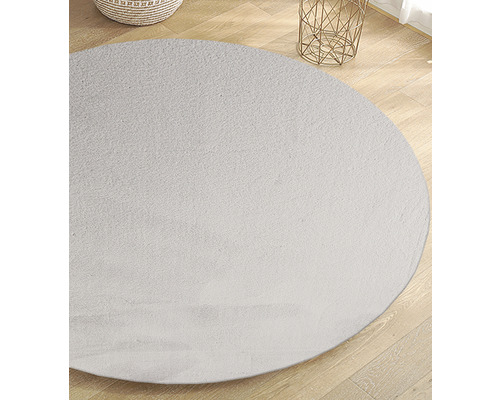Tapis rond sur parquet