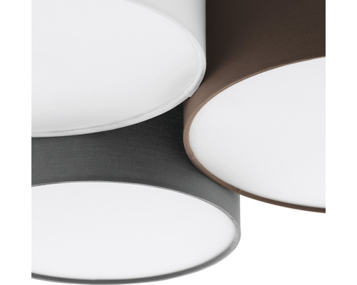 Gros plan d''un plafonnier avec abat-jour en tissu