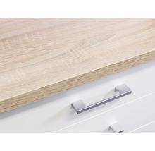 Gros plan d''une commode avec tiroirs et plateau en bois