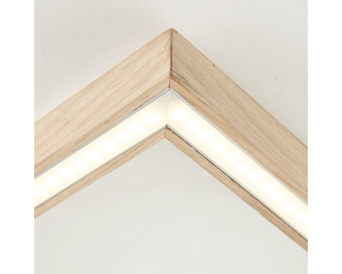 Detailaufnahme eines Holzrahmens mit LED Beleuchtung