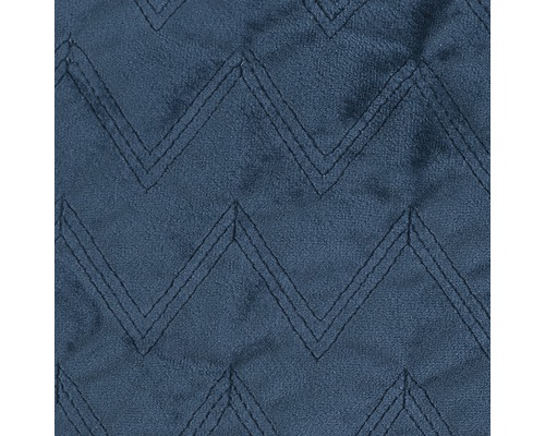 Gros plan d''un tissu matelassé avec un motif en zigzag