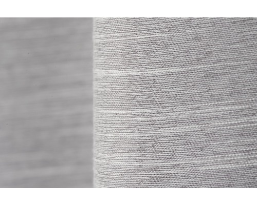 Gros plan d''un tissu d''ameublement gris avec une fine structure tissée