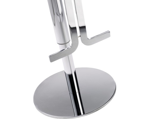 Gros plan sur le repose-pieds et le pied rond d''une base de tabouret de bar en métal